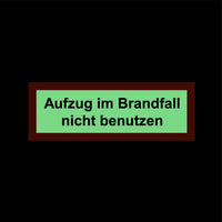 Brandschutzschild Alu 210x74 Permalight power 150/22 "Aufzug im Brandfall nicht benutzen"